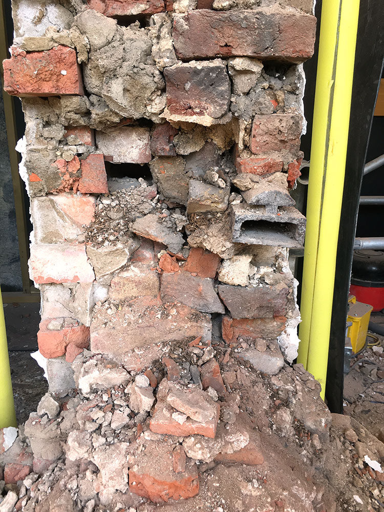 Rubble Brick Wall Core Requiring Consolidation. GHK Architects
